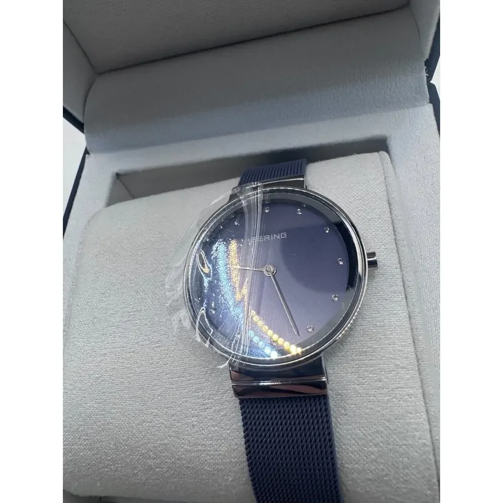 Bering Classic 10131-909 Lavender Dial Mesh Stainless Steel Women’s Watch
